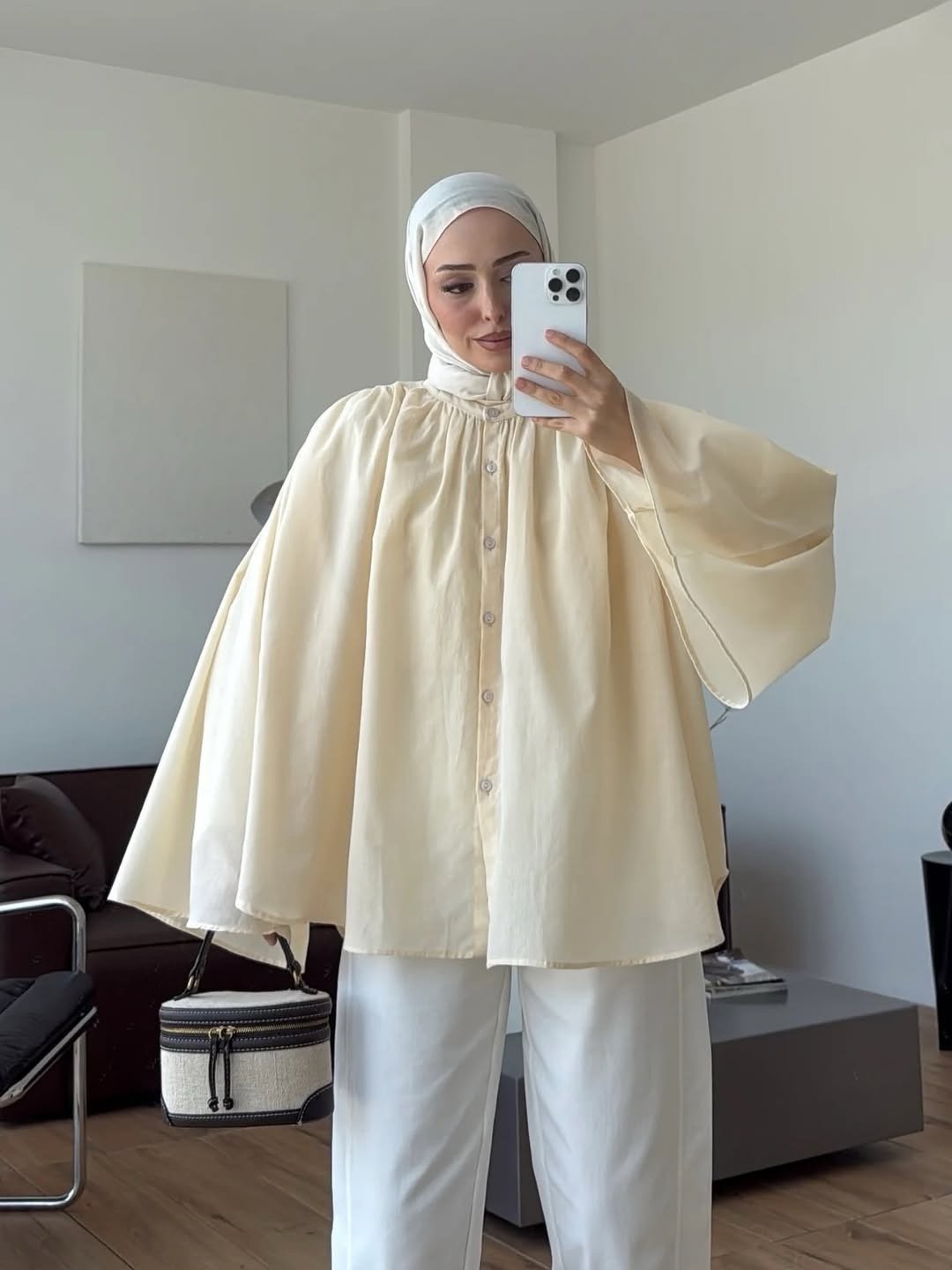 قميص نسائي واسع بتصميم كلوش من الخلف وأكمام واسعة